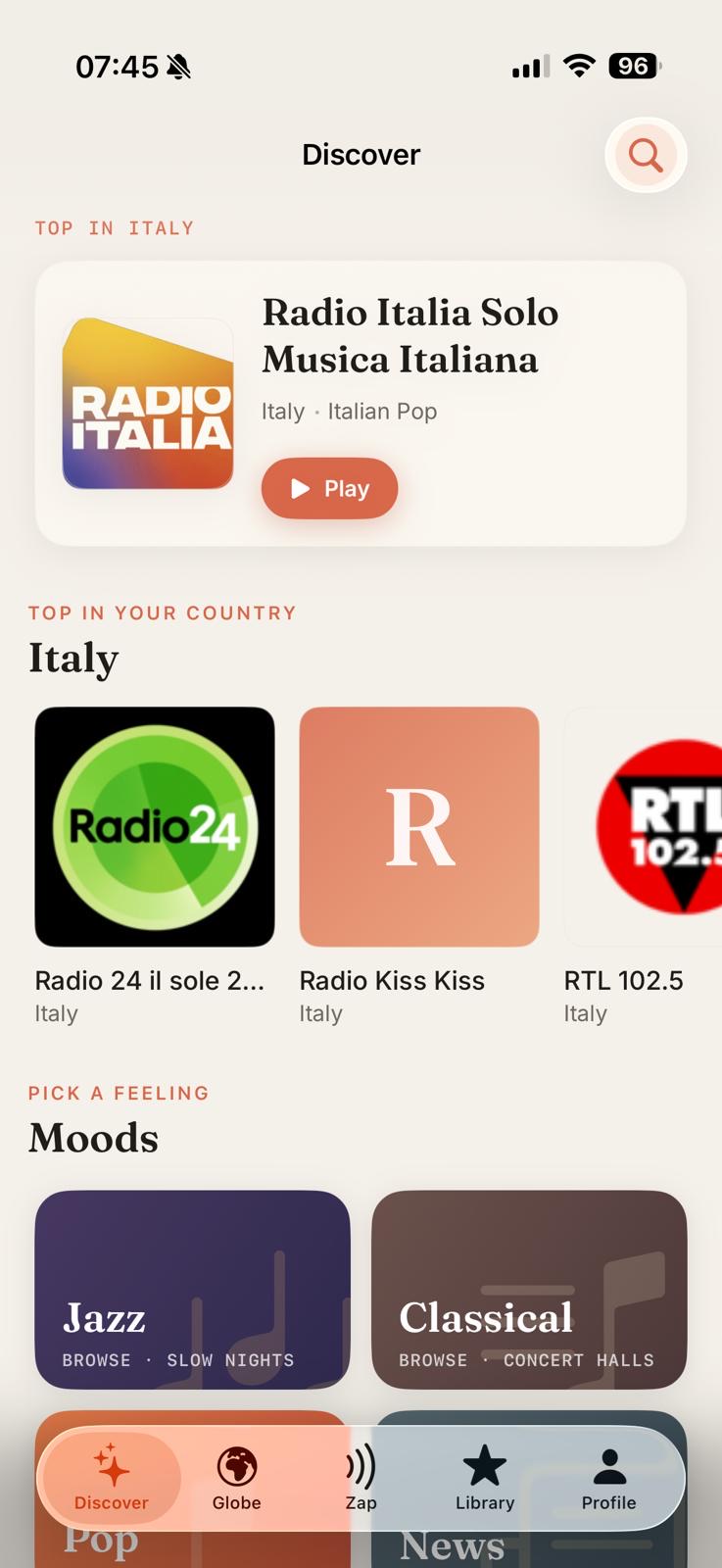 The Discover tab with a featured Italian station, top picks from Italy, and mood tiles like Jazz and Classical