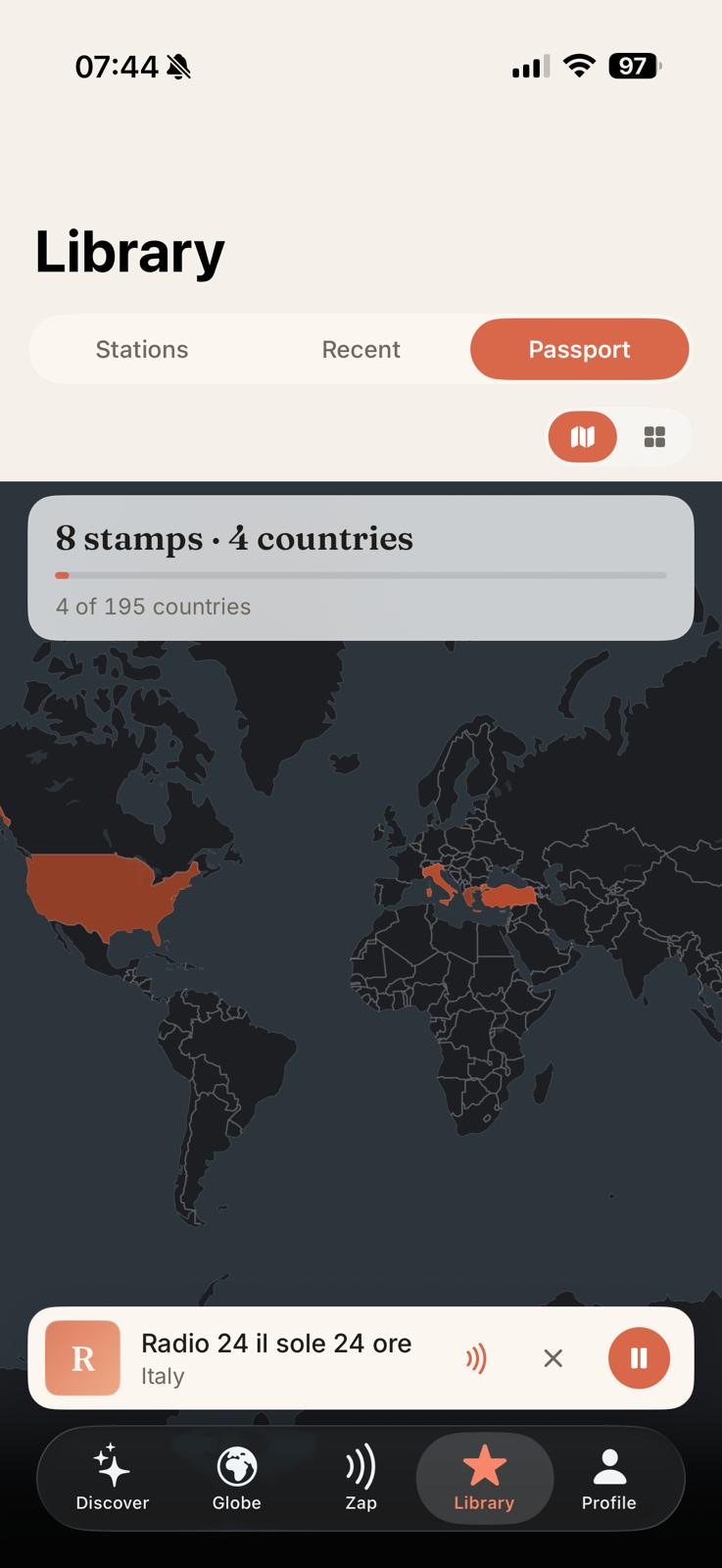 The Passport with a world map filling in with colour — eight stamps across four countries