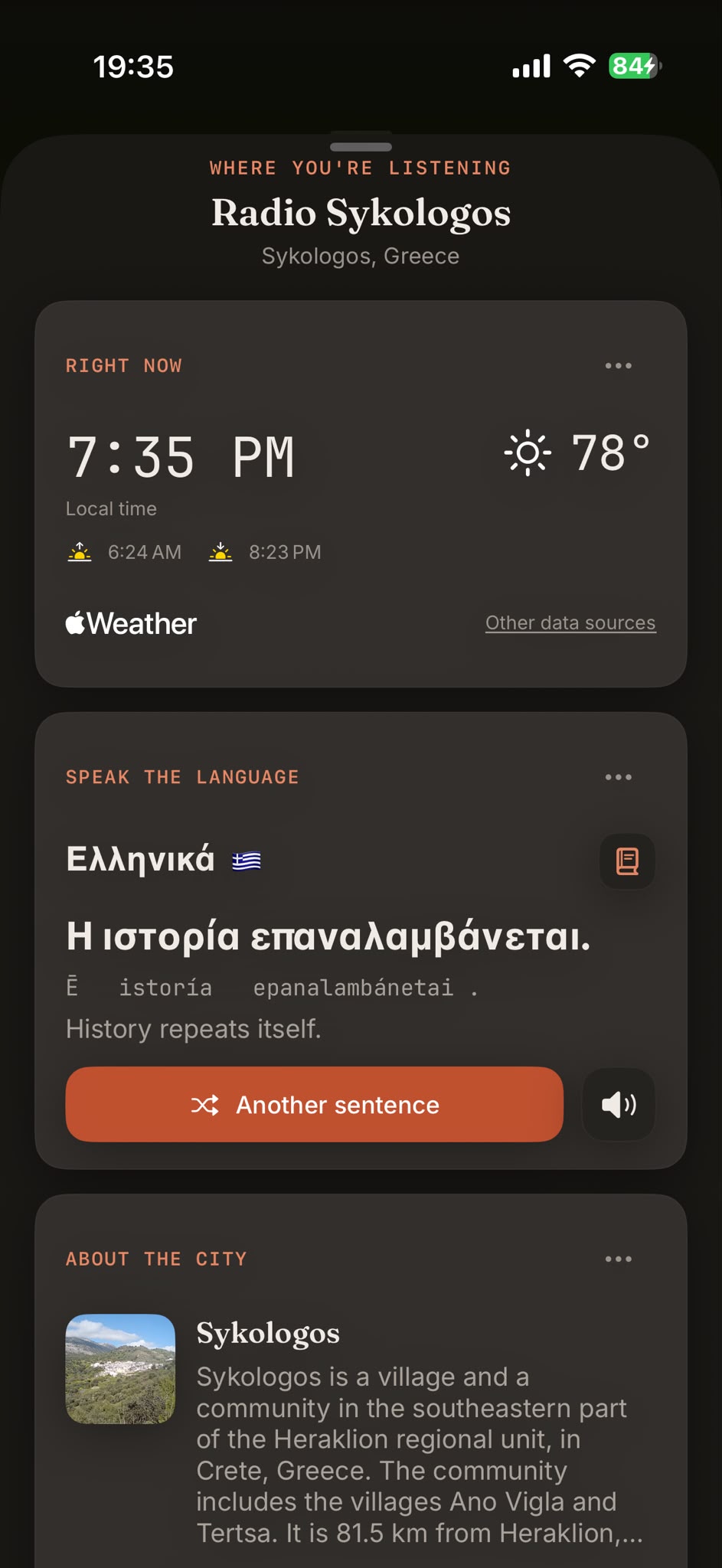 The place card for a station in Crete: local time, weather and a local phrase
